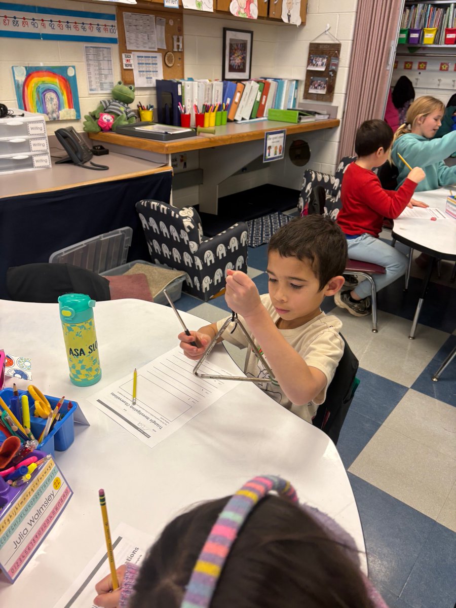 Students exploring sound with triangles. How do objects make and send sound signals?