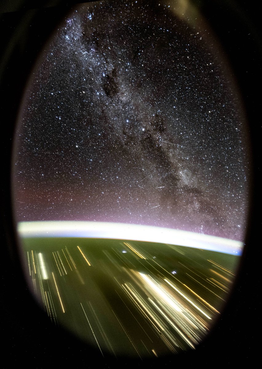 Milky Way views through the window of Dragon. City lights streak below, and distant satellites flash marks across the exposure while stars remain fixed thanks to my homemade tracker. The result is a contrast of activity between Earth and the stillness of deep space.