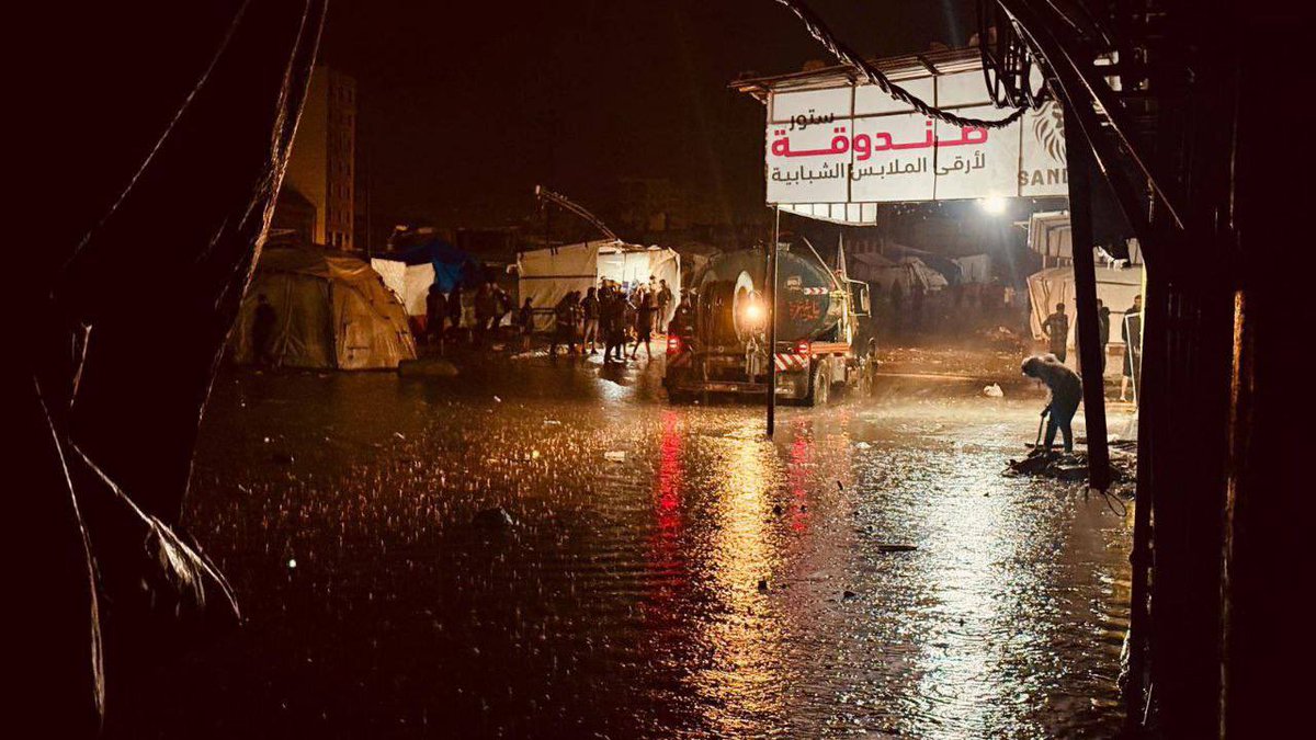 A new hardship for displaced people after their tents were flooded by rain west of Gaza City.