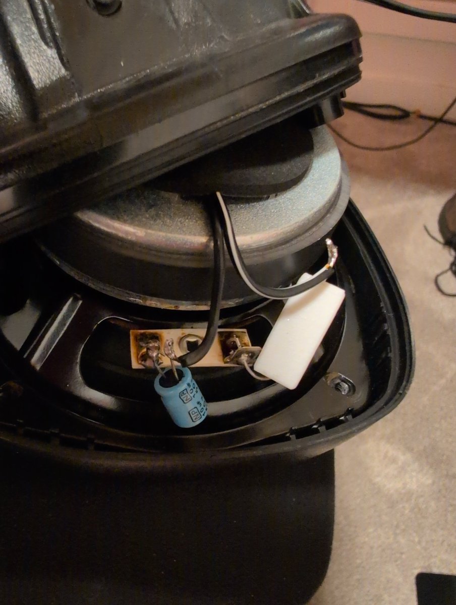 Settled on an 8.2ohm resistor and a 10uf cap to pad down my home base radio speaker. Decided to try a cap for a little high pass action. I think its pretty good this way, especially since its under my desk, brightens up the sound a touch.