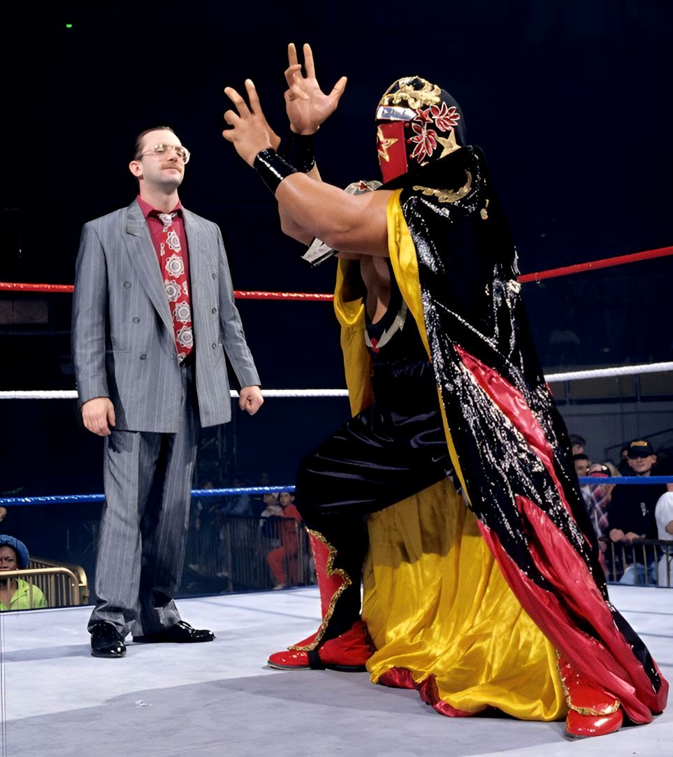 WWFWrestling1's tweet photo. "Currently in the ring with his manager, Harvey Wippleman... from the Orient... weighing 258 lbs... KWANG!" #WWF #WWE #HarveyWippleman #Kwang https://t.co/ZuRf3MY48F