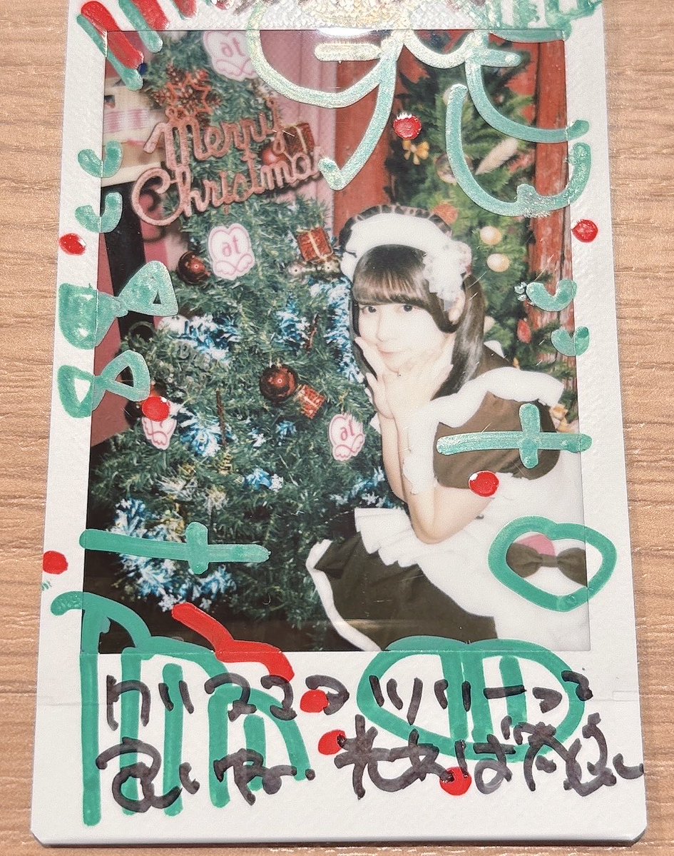 新しいスマホの裏のチェキ