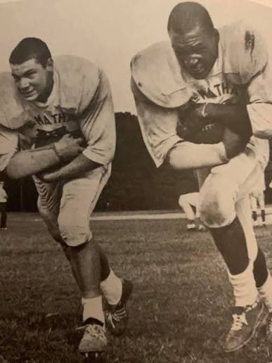 DeMathaCatholic's tweet image. Saddened to learn of the death of Garrett Ford '64 (right). Pictured here with the late Brendan McCarthy '64.  The two would also start in the same backfield with the Denver Broncos.  Garrett is in the DeMatha Hall of Fame.  He had an excellent career in college at West Virginia.