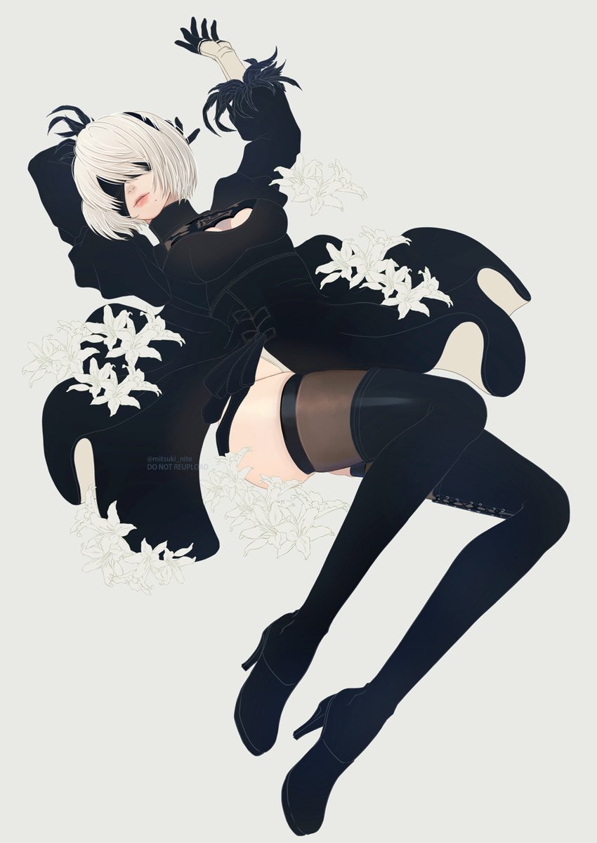 2B lying down with flowers