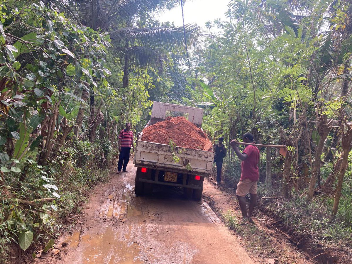 UNDPSriLanka's tweet photo. Turning recovery into resilience. 
In Rideegama Pradeshiya Sabha, early recovery efforts are underway together with Local Authorities with support from the @UNDP led, @theGEF funded Chemical and Waste Project. Soil from recent landslides is being safely reused for flood-damaged road reconstruction—restoring access while promoting sustainable resource use.

#EarlyRecovery #SriLanka #CycloneDitwah