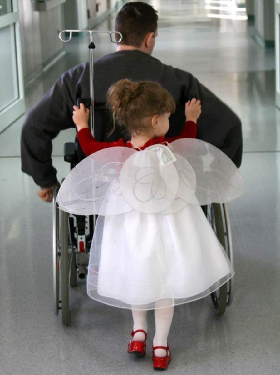 Wounded warrior and his little angel