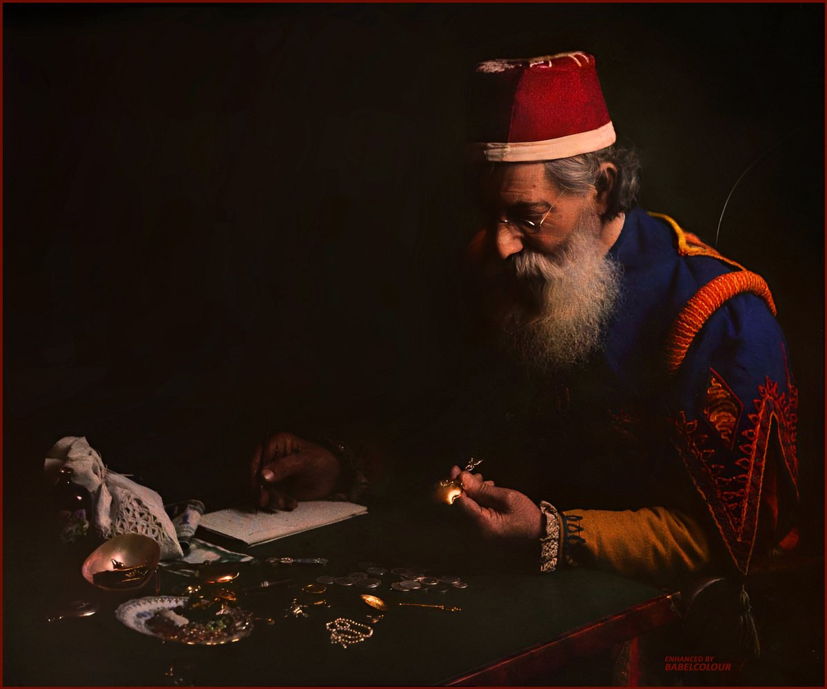 StuartHumphryes's tweet photo. Photographed in colour 115 years ago, this truly astounding autochrome plate is like a Rembrandt painting, with a mastful understanding of light & shade. It depicts a pawnbroker evaluating jewellery, and was photographed by Dr W. Simon in 1910. It is original colour, not colourised.