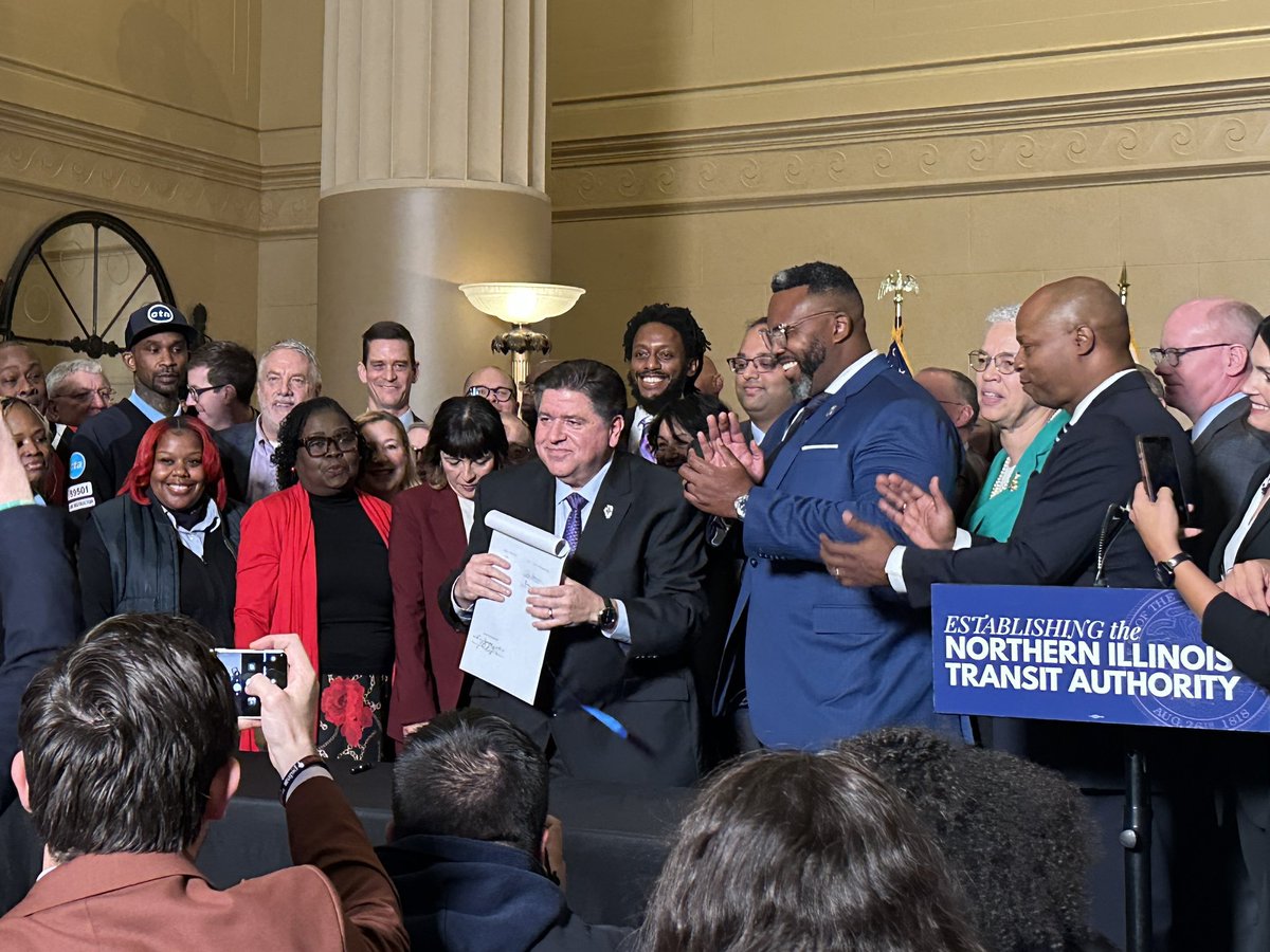 SenMikeSimmons's tweet photo. We have finally done it. $1.5 Billion in transit funding and reform is now official! This morning, I joined Governor Pritzker, colleagues, and transit workers in Union Station as the Governor signed Senate Bill 2111 into law. (1/2) https://t.co/Z6M8vqa1aT