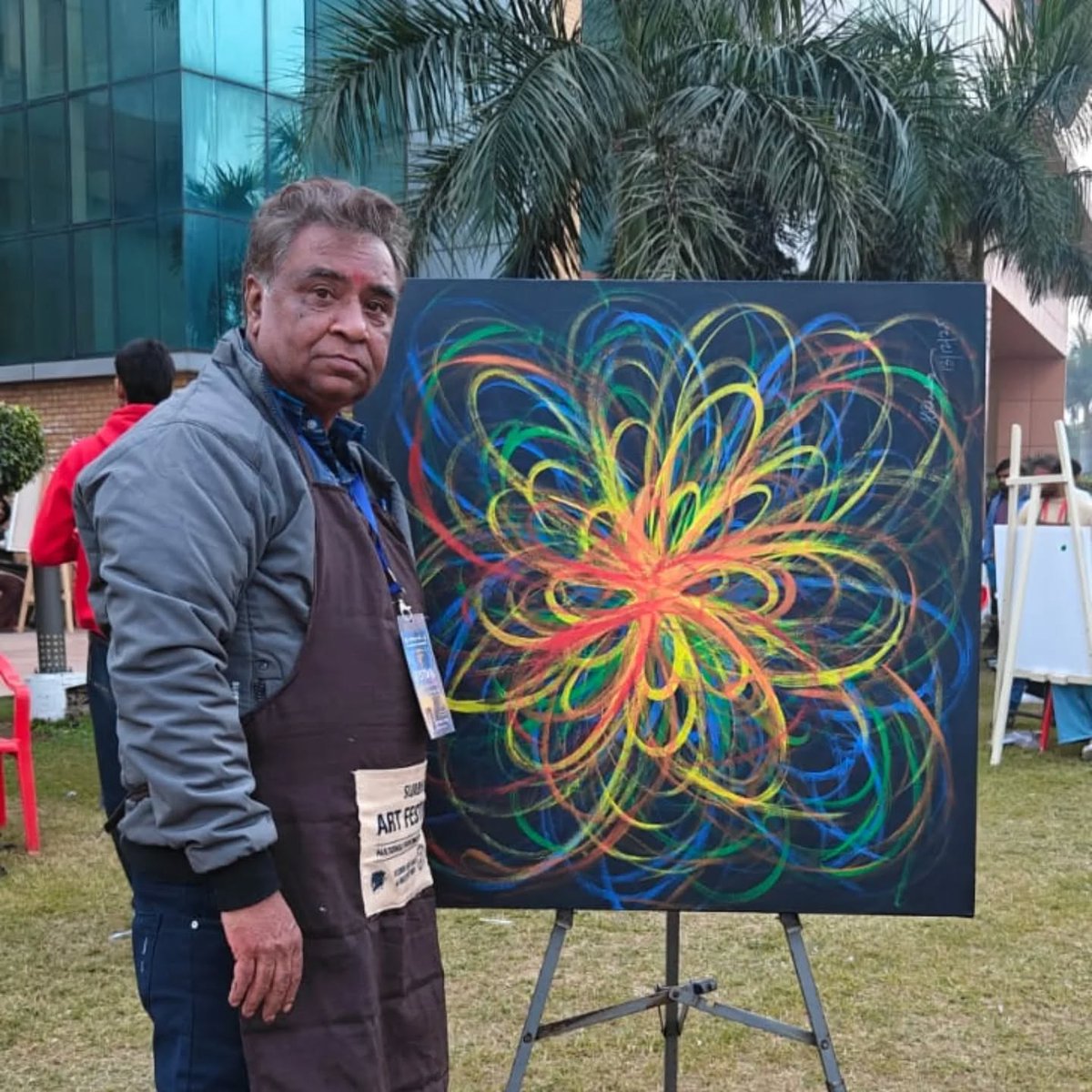 ARTINFOINDIACOM's tweet photo. Painting ‘Evolving Rainbow 6’/Acrylic on Canvas/36x36 Inches, Created by Kishore Shankerr during the Surbhi Art Festival 2025 (13-14/12/25), organized by Surbhi Arts Society, at Guru Jambheshwar University of Science and Technology, Hisar. Picture Curtsy – Artist Ashok Mahakur https://t.co/HLVi84Q4iz