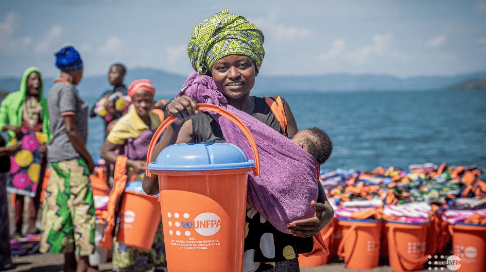 UNFPA_ESARO's tweet photo. In the aftermath of the 2023 DRC floods, dignity is an emergency supply. Over 500 women & girls received UNFPA Dignity Kits (soap, pads, essentials). This isn’t just aid, it’s restoring personal hygiene & safety when everything is lost. Dignity cannot wait. #DRCFloods #DignityKit https://t.co/XdFYM0OLcF