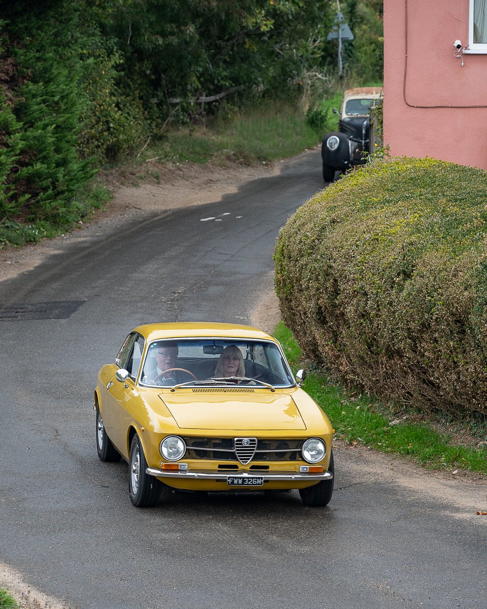 Sunny roads, a ‘60s Alfa Romeo GT glowing golden, and a couple enjoying the ride through England’s lush countryside. Throw on your best threads and join us on September 27th, 2026.

📸 <a href="/j/">j</a>.c.moto  
🌎 England, Bury St Edmunds - Suffolk
