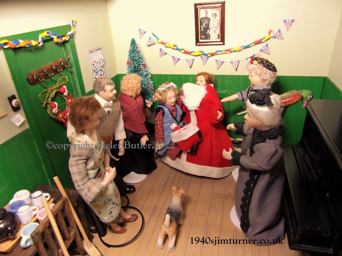 1940sJimTurner's tweet image. Bertram Valentine has put on his Santa outfit to play his biggest (&amp;amp; most exhausting)role of the year! Its been very popular.Enid enjoyed sitting on his knee.Then she took his hat &amp;amp; beard off.We're not sure where she got mulled wine from,but we think thats what shes been drinking