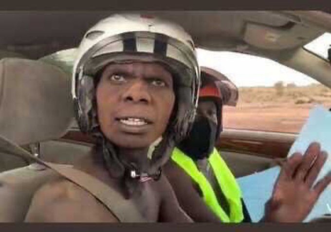 In my borrowed car asking villagers where our home is to let them know that its me who has come with a car