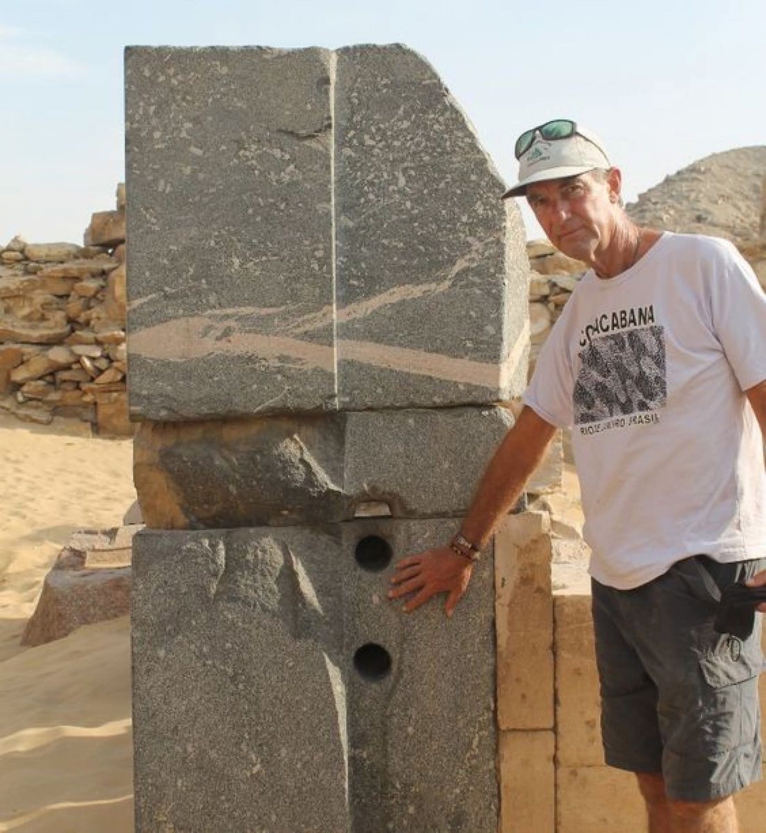 histories_arch's tweet photo. THE MYSTERIOUS DRILLED STONE OF ANCIENT EGYPT

Meet one of the most intriguing stone artifacts ever found in Egypt, a massive granite block precisely cut and drilled thousands of years ago, standing silently in the desert landscape. Estimated to date back to the Old Kingdom period, this stone challenges our understanding of early Egyptian stone-working technology.

What immediately draws attention are the perfectly round cylindrical holes drilled straight through extremely hard granite—work that, even today, would require advanced tools and controlled techniques. The clean edges, symmetry, and alignment suggest a level of mechanical precision far beyond what is typically attributed to ancient copper tools, raising ongoing debates among archaeologists, engineers, and researchers.

Standing beside this block, one cannot help but feel that parts of ancient Egyptian knowledge have been lost to time. Whether the result of forgotten methods, experimental engineering, or an underestimated civilization, this stone remains a powerful reminder that the past may have been far more technologically sophisticated than we dare to imagine.

#archaeohistories