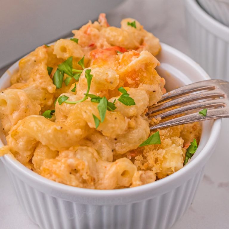 This homemade Lobster Mac and Cheese features tender lobster, a perfectly seasoned cheese sauce, and a buttery breadcrumb topping. #lobstermacandcheese #macandcheese #macaroniandcheese #pasta #lobster #dinner #macaroni melissassouthernstylekitchen.com/lobster-mac-an…
