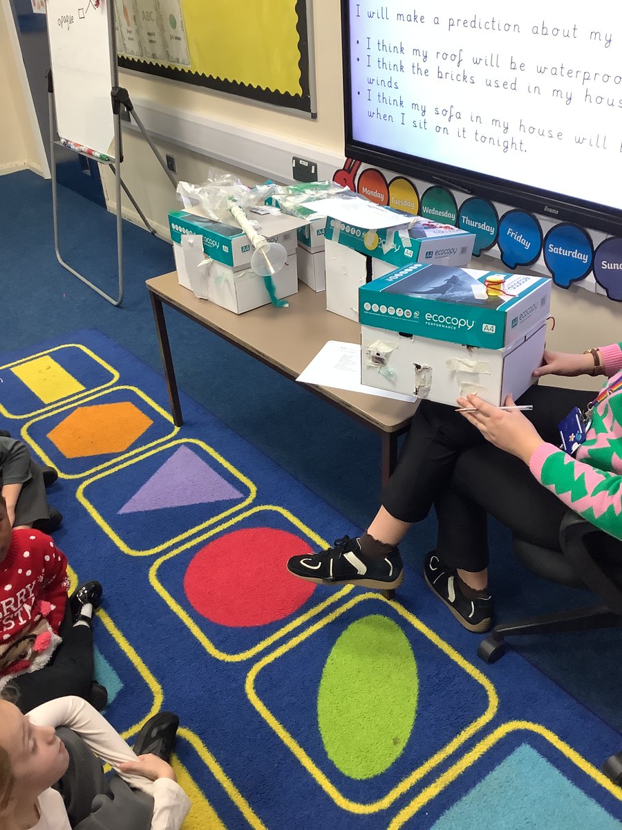 Year 1 built houses in Science to test some materials and their properties. They needed to include a door, window, rug and roof. They discussed having a waterproof roof, transparent window, soft rug and strong door. They worked together well and were excited to see the results.