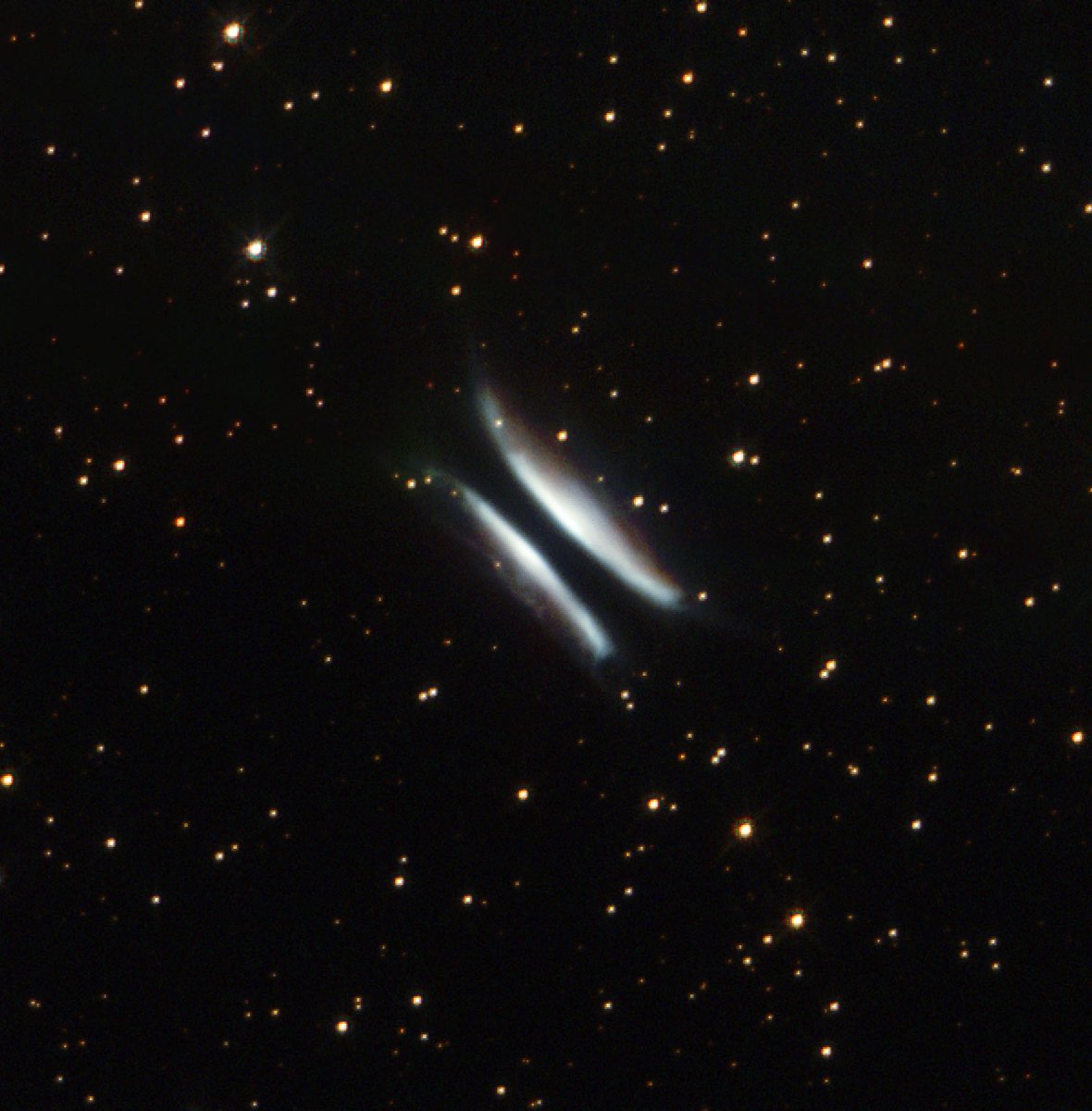 NASAHubble's tweet photo. Order up! 🍔

Nicknamed Gomez's Hamburger, this cosmic object is actually a Sun-like star nearing the end of its life.

The "buns" are light reflecting off dust, and the "patty" is the dark band of dust in the middle. Uncover more: https://t.co/Hoo23oCiKq https://t.co/FeuDivxI3d