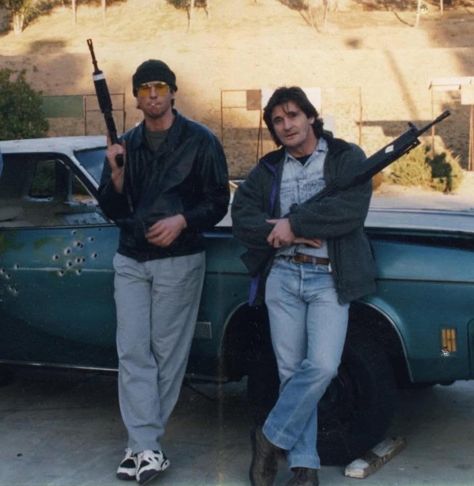 Val Kilmer with the weapons instructor on Heat looking cool as fuck