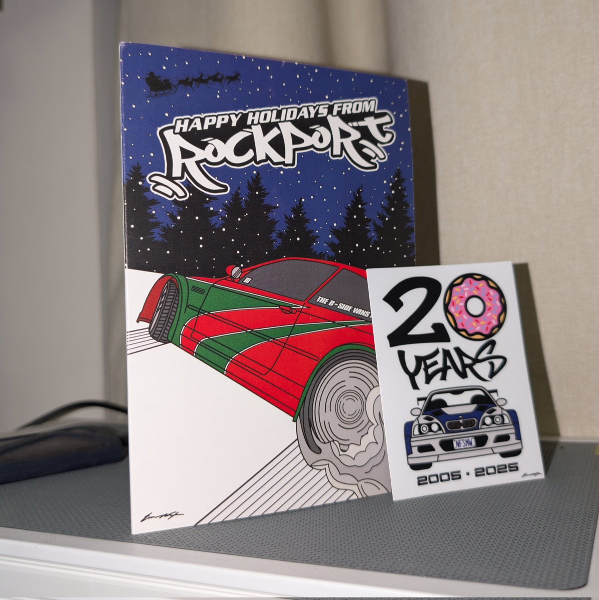 Another banger Christmas card (and sticker!) from <a href="/EvanNixonType4/">EVΛN NIXON TYPE 4</a>, celebrating 20 years of <a href="/NeedforSpeed/">Need for Speed</a> Most Wanted 👏
