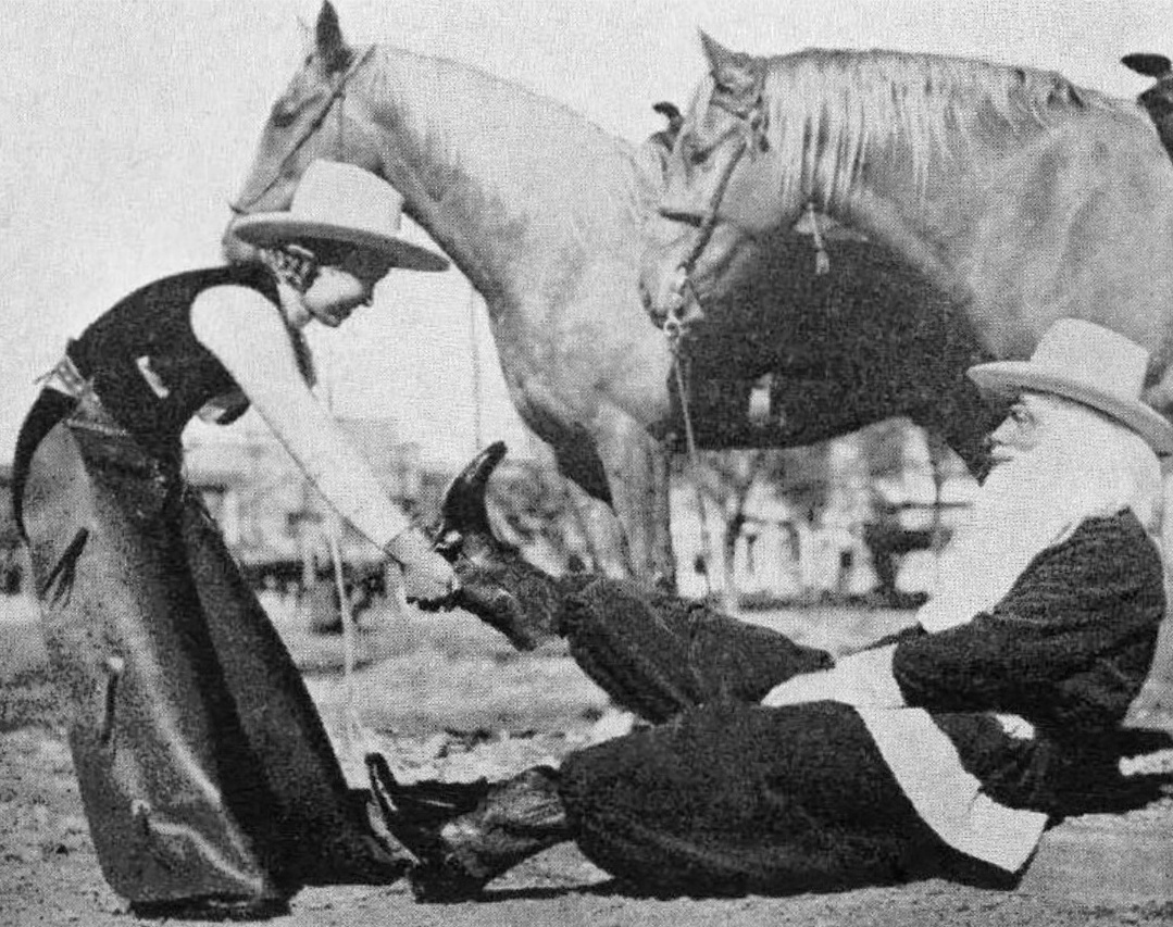 FlashbackDallas's tweet photo. Merry Christmas! As construction work was going on in Fair Park for the 1936 Texas Centennial, Santa and his Texas cow ponies were getting ready: a Centennial Rangerette had to help Santa don and doff tight cowboy boots. (Centennial Times, 12/21/35, Dallas Historical Society) https://t.co/axaybxteUk