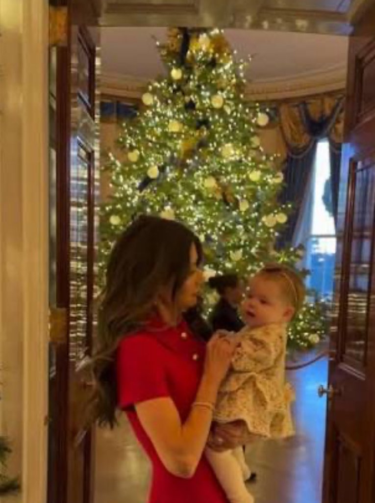 What is Kristi Noem telling the baby??