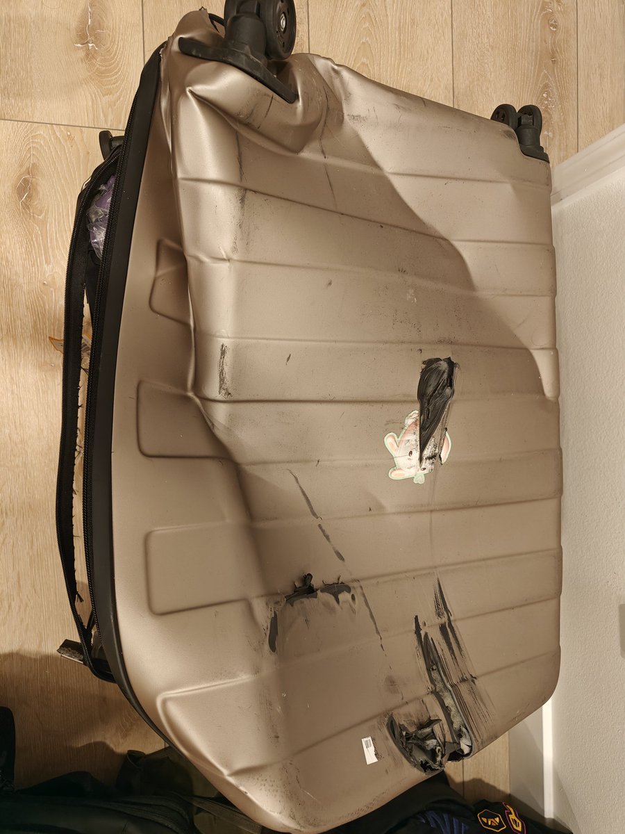 BoxBox's tweet image. Was on my way home from Paris on @airfrance and they said my luggage was temporarily delayed. I waited 3 days to get and I noticed there's something different about it.

Asked around and found out it fell out of the transport vehicle and was run over by a truck.