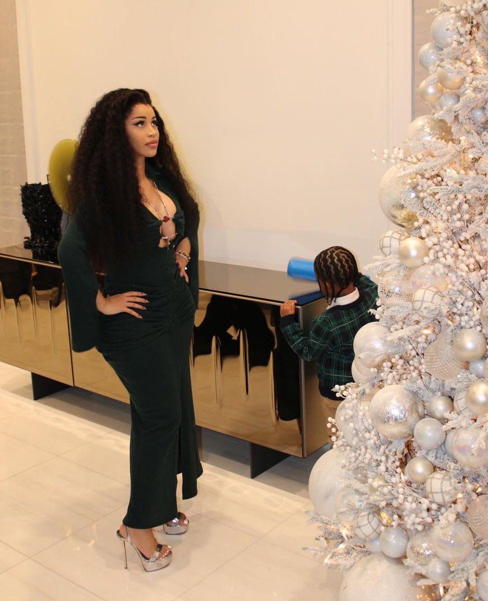CCardib2's tweet photo. Cardi B admiring her Christmas tree 🤍 https://t.co/6hOAq8iqmH