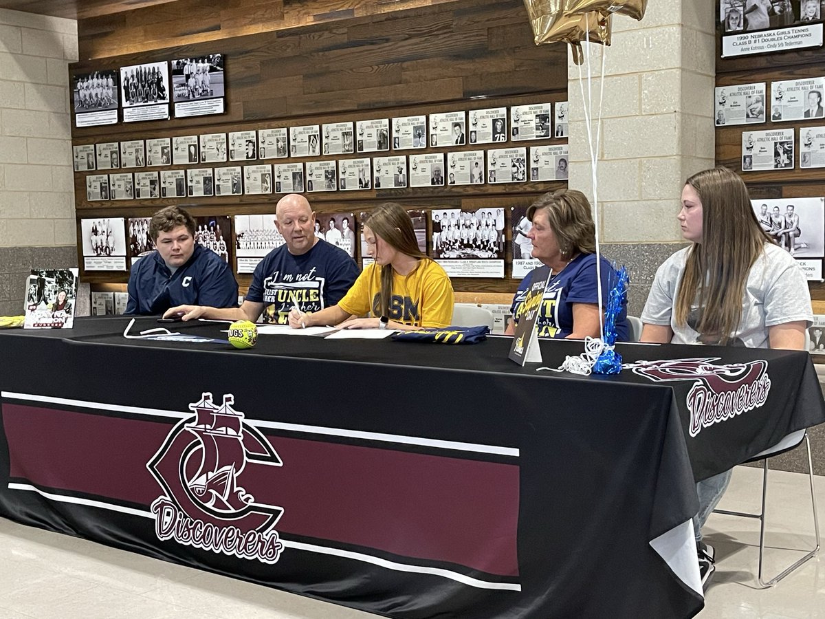 newman_coach's tweet photo. So Proud of our BUGS! 

Today, alongside her family, coaches, and teammates, Alayna Kudron signed to play 🥎 at CSM next year! @CSMFlamesSB 

Looking forward to seeing you continue to play the game you love the most 🤍 Go Flames 🔥

#TheDiscovererWay #Alum https://t.co/dr3tVD03Ku