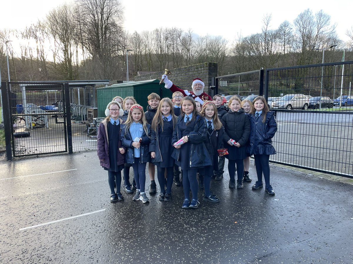 Some of P5 met Santa in the playground. They were so excited to see him.