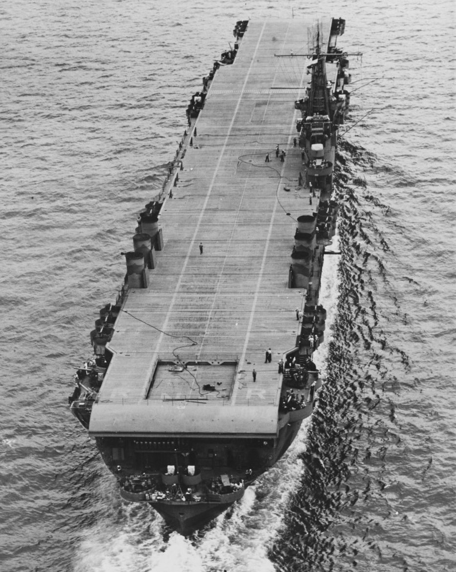 Boneyardsafari's tweet photo. USS Ranger CV-4 underway off of Virginia in 1942, note the flight deck identification letters R N G R still visible just ahead of the ramp. #ussranger #cv4 #boneyardsafari #navalsafari https://t.co/NAcr5QfoGU
