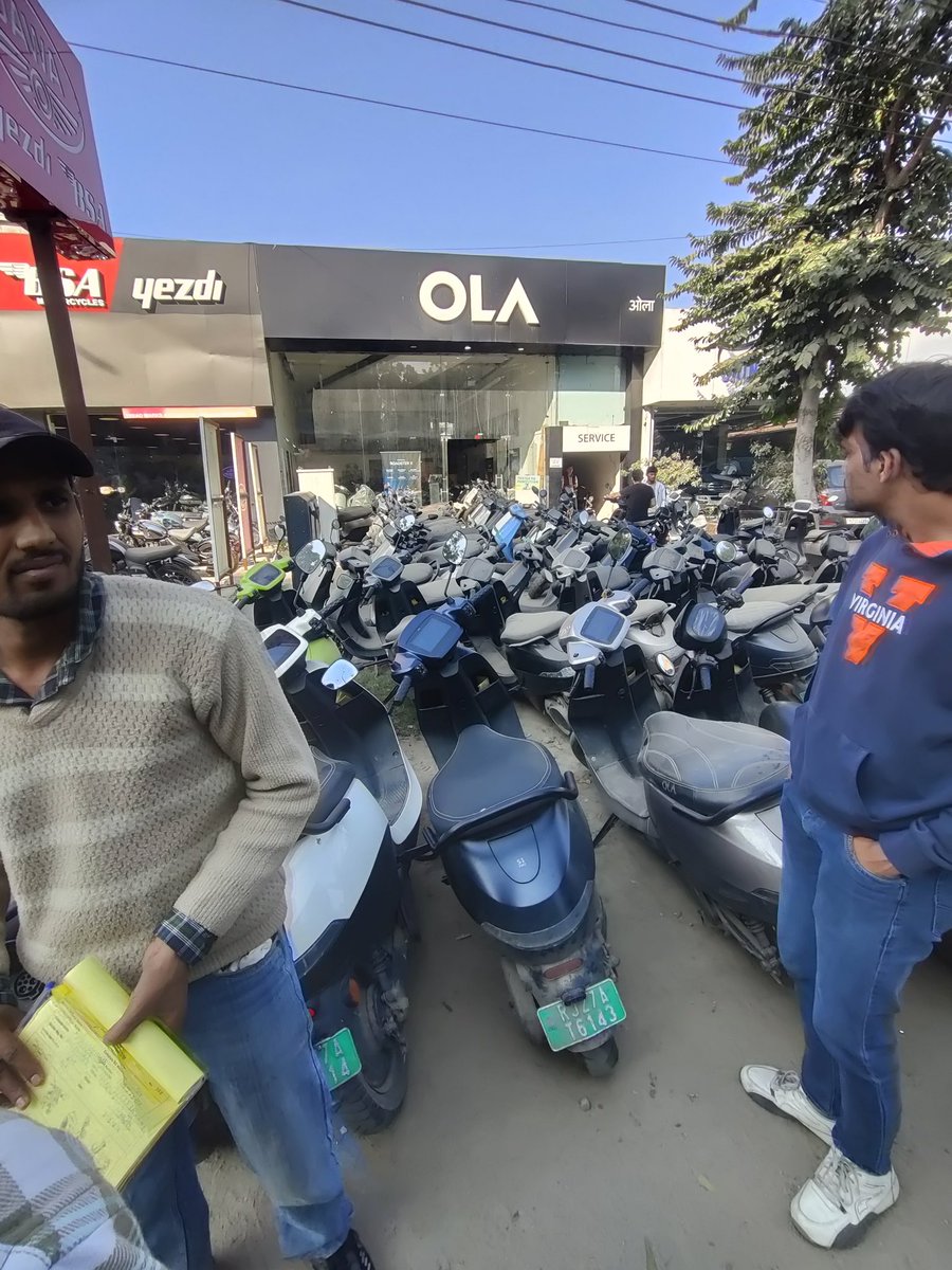 Qk011's tweet photo. Thank you soo much @OlaElectric @Olacabs @bhash  
I would also like to thank you for allowing  them to sell more vehicles and giving services like that @nitin_gadkari 
In the 2nd photo everyone can see how all vehicles are resting outside the service centre just like trash. https://t.co/Lfs6AgOS0s