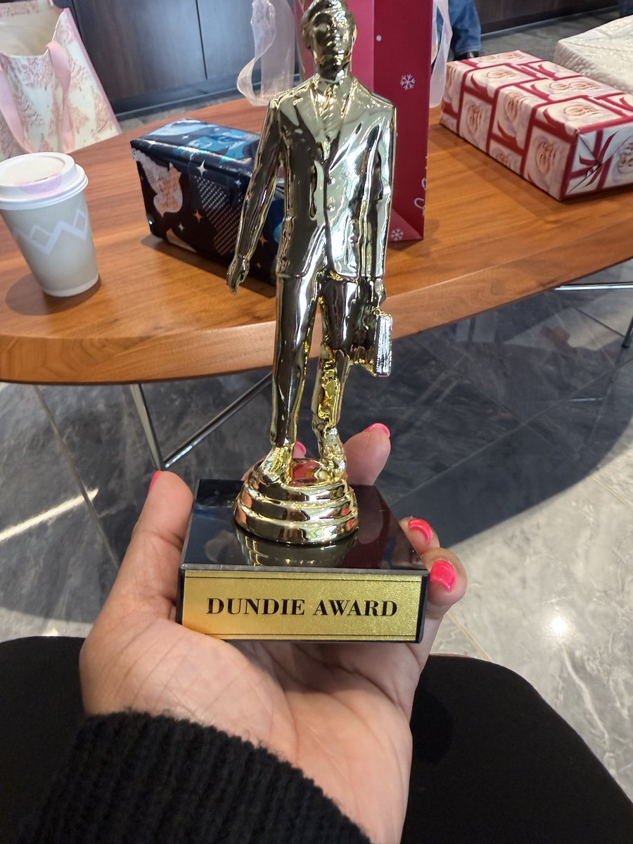 C_Wins_'s tweet image. Christmas party shenanigans and I got the Dundie award! #Christmas2025 #ChristmasParty