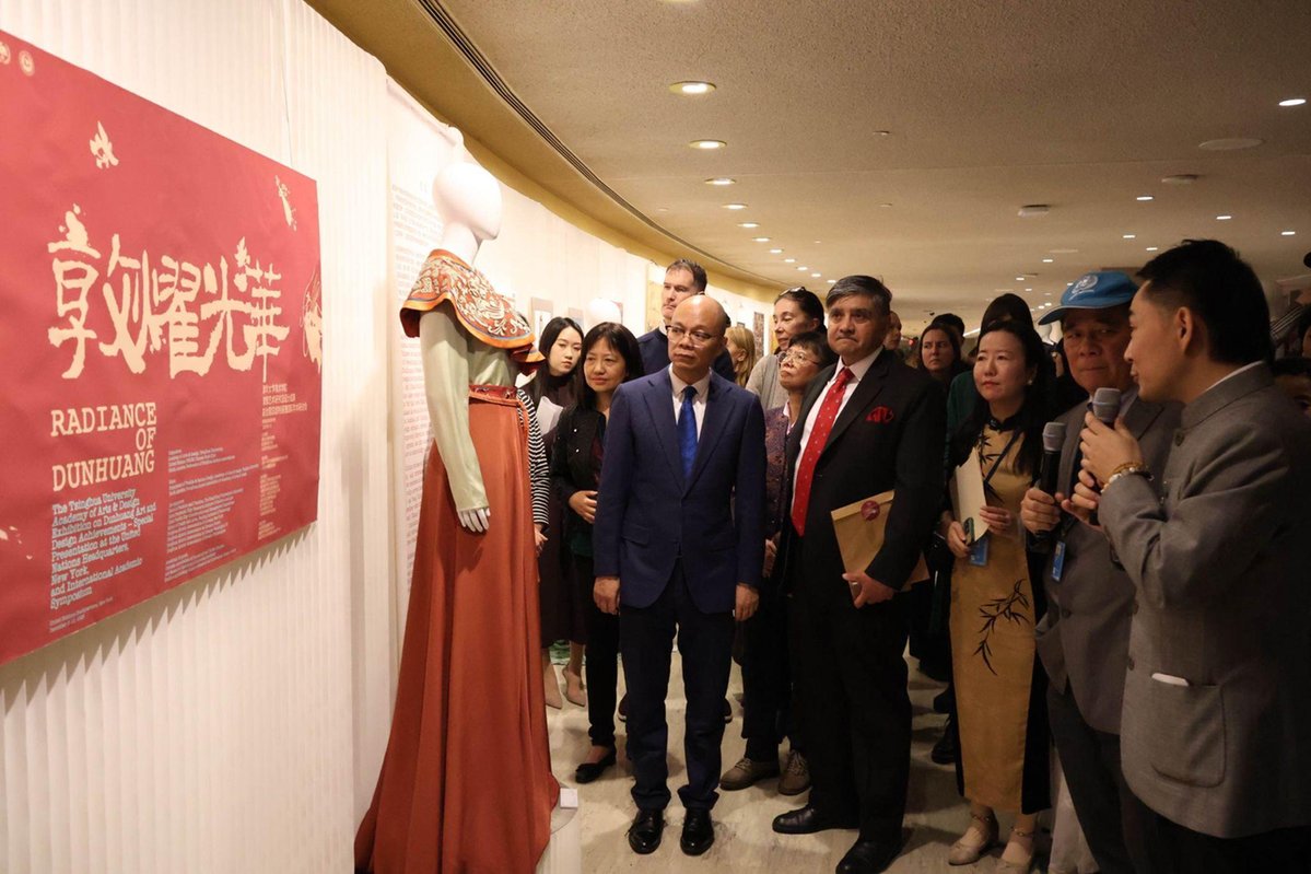 SRDICEinChina's tweet photo. Tsinghua University's Academy of Arts and Design showcased its artistic and design research on Dunhuang culture at the United Nations Headquarters on Dec 8. The exhibition was attended by over 200 people, including UN staff, international guests, and Tsinghua alumni. This marked its second international stop, following its premiere at the China Cultural Center in Paris in October 2024. @Tsinghua_Uni