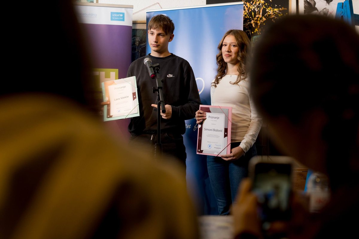 UNICEFKosovo's tweet photo. With support from the @UNPeacebuilding Fund, thousands of young people in Kosovo strengthened leadership, peacebuilding &amp; critical-thinking skills. Inspiring examples include Simona &amp; Lav, recipients of the “You Are a Leader” award, proving youth activism drives positive change. https://t.co/wMDj0MrkEq