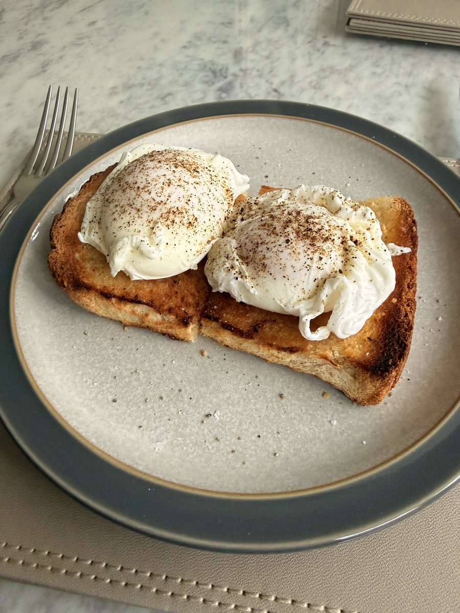 Two perfectly poached Burford Broon eggs on a plain ootsider!