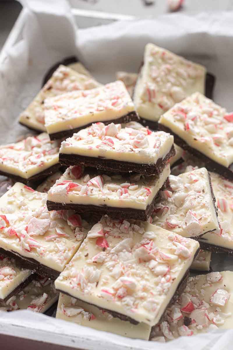 Peppermint Bark is creamy layers of white and dark chocolate and refreshing peppermint! It's an easy no bake holiday treat that's perfect for the holiday cookie tray and it's great for gift giving! flavorthemoments.com/peppermint-bar…