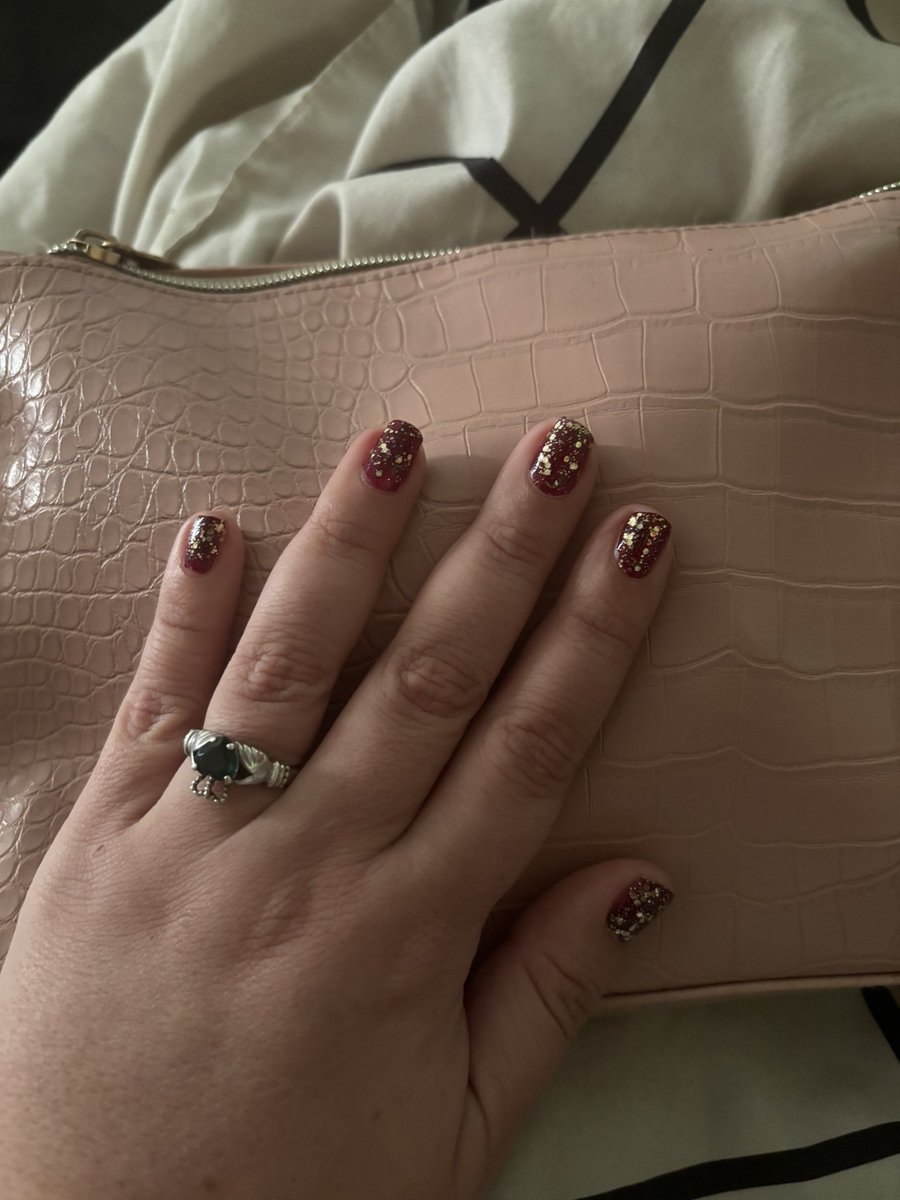 I’m obsessed with this gold glitter nail top coat. I’ve worn it with either this red or a navy blue for like two months now. I use another smaller glitter first to give it dimension in the ✨shine✨