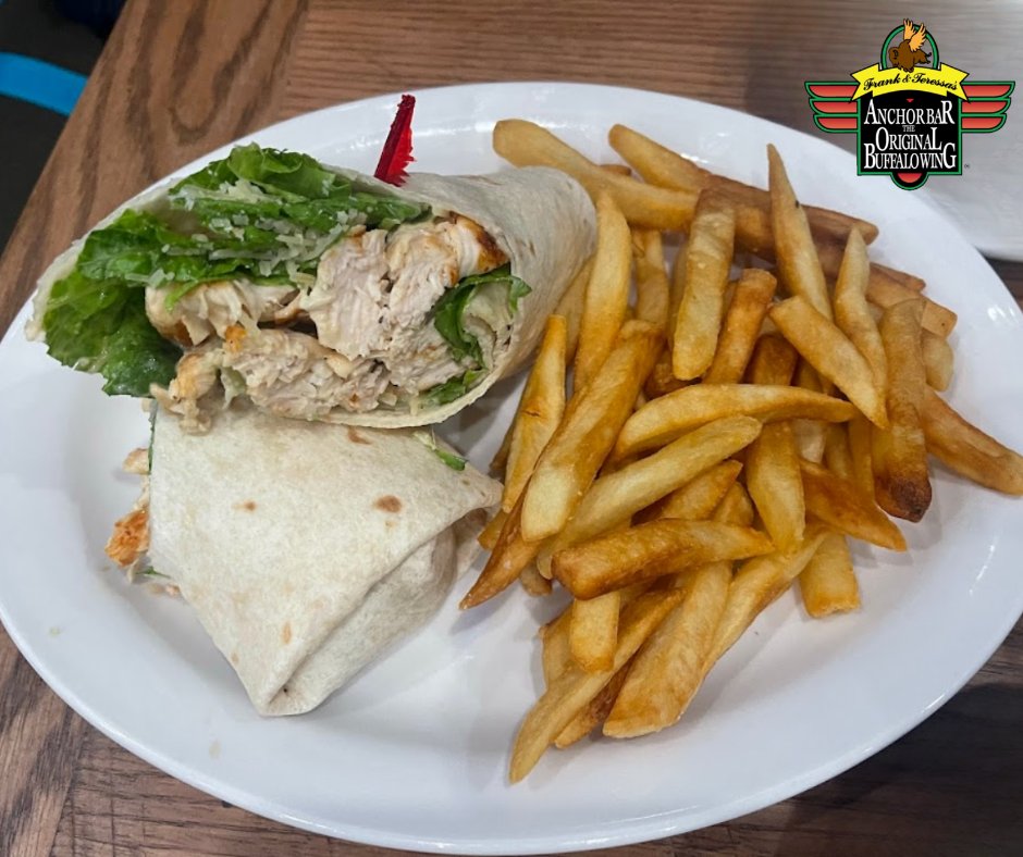 🍗 Of course everyone loves our wings, but have you tried our wraps? 🤔 They're so good they might just make you forget all about those saucy beauties! 😄 Come on, give them a whirl—your taste buds will thank you! 🌯✨ #WrapItUp #WingsVsWraps #FoodieFun