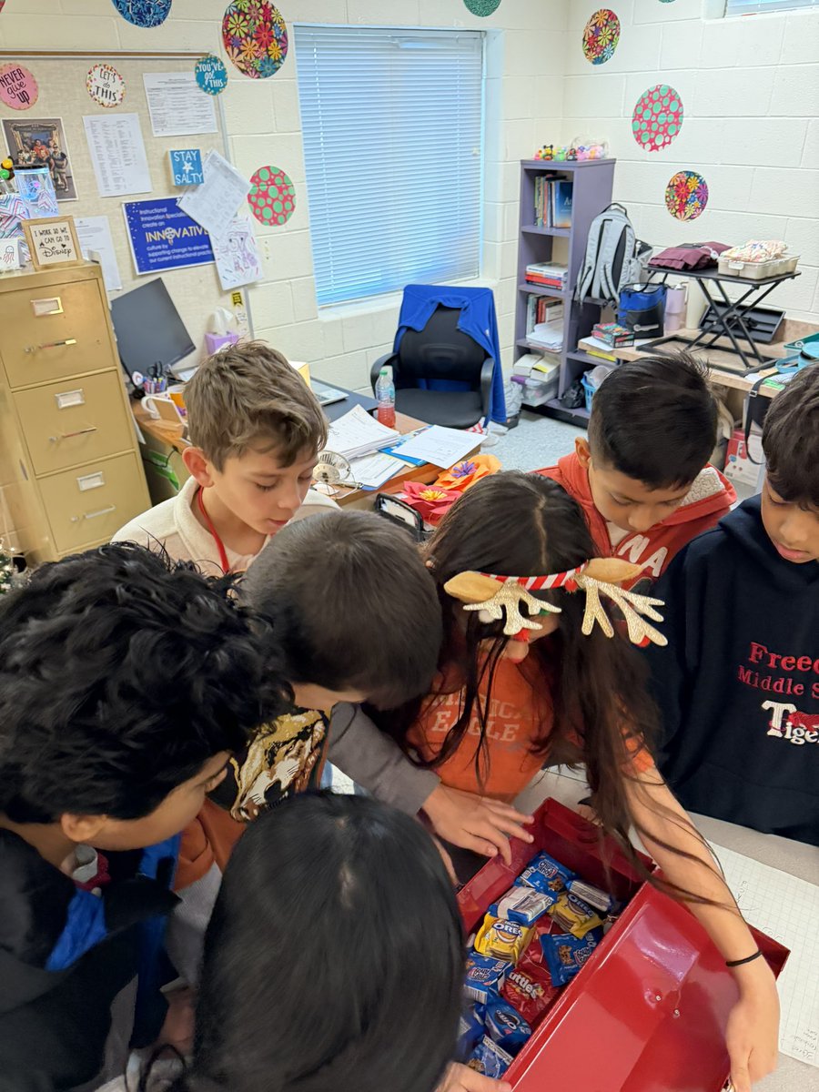 Holiday vibes are in full swing! 🎁❄️ Our 5th grade students are teaming up to crack the code and unlock the winter treats! 🍬✨ #huskypride
