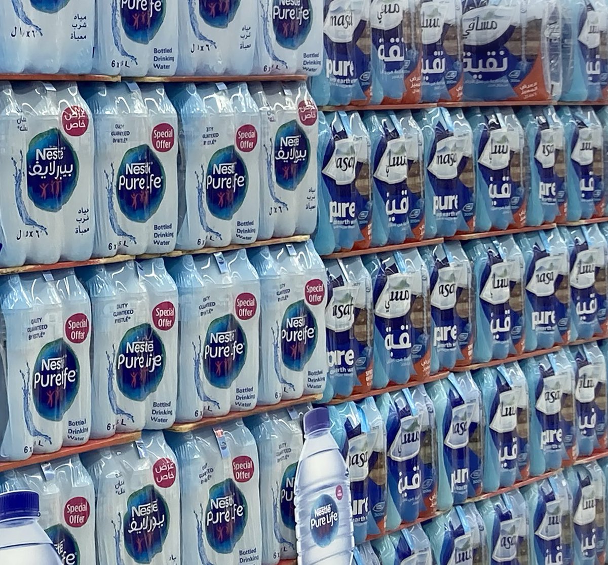 whatsontheshel1's tweet photo. Water packs arranged on pallets in a Dubai supermarket.

https://t.co/HBYydJFX0V

#water #hydration #supermarket #dubai #bulkshopping #Masafi #AlAinWater #OasisWater #MaiDubai #Aquafina #NestlePureLife #Evian #Perrier https://t.co/5TNEA6PRyf