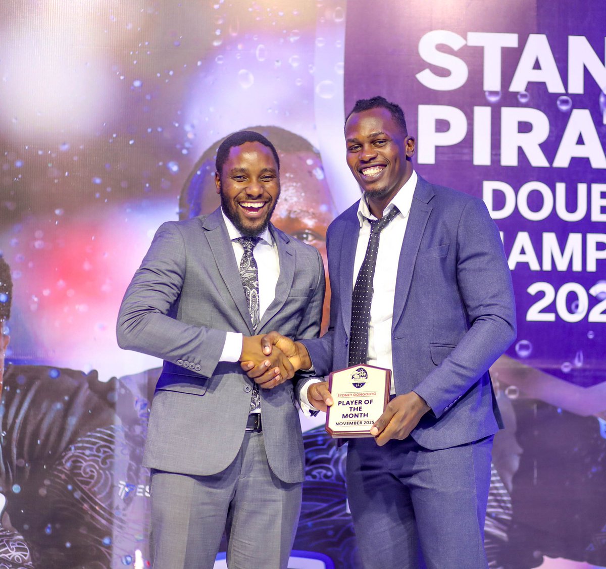 <a href="/stanbicug/">Stanbic Bank Uganda</a> <a href="/NileSpecial/">Nile Special</a> <a href="/nextradio_ug/">Next Radio 106.1FM</a> <a href="/Kingsparkarena/">King's Park Arena</a> <a href="/roketelkomug/">Roke Telkom</a> <a href="/blacklyfug/">Blacklyf</a> <a href="/AquafinaUganda/">Aquafina Uganda</a> <a href="/capitalonegrp/">Capital One Group 🇺🇬🇰🇪</a> <a href="/tradelanceug/">Trade-Lance</a> <a href="/piratesfansug/">Pirates RFC Fans</a> November- Sydney Gongodyo

#StanbicPirates ll #RokeWithPirates ll #VisitKPA ll #PiratesStrong