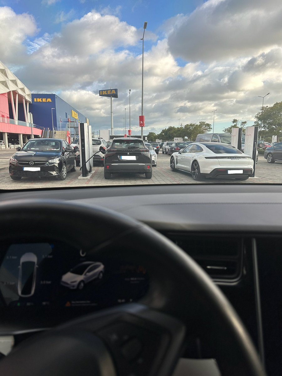 richardslopes83's tweet photo. Well, @TeslaCharging is killing 🚀

Many non Tesla cars charging @ Supercharger while the others right next to them are vacant… 
Price and understanding how much you will pay for your session easily opens a big gap to others.
Legislation is now in place and soon will put even more pressure on those who charge almost the double, like this #BP @iberdrola HUB, good location, 10 chargers, HPC power but the price ☠️

Portugal was in the dark age since they ruled @Tesla out of the EV mobility! Thankfully this @govpt managed to get the sustainable transportation back on track!

2026 will be an amazing year for EV mobility 

📍 Loulé, Marshopping Portugal 🇵🇹