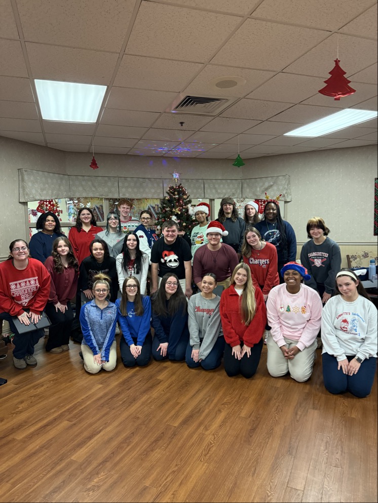 Our Advanced Chorus visited the Carbondale Nursing Home and Aventura At Creekside today to spread some joy and Christmas cheer. They sang Christmas carols for residents, and then caroled for the office staff and teachers. One of the best parts was meeting Elsa the service dog!