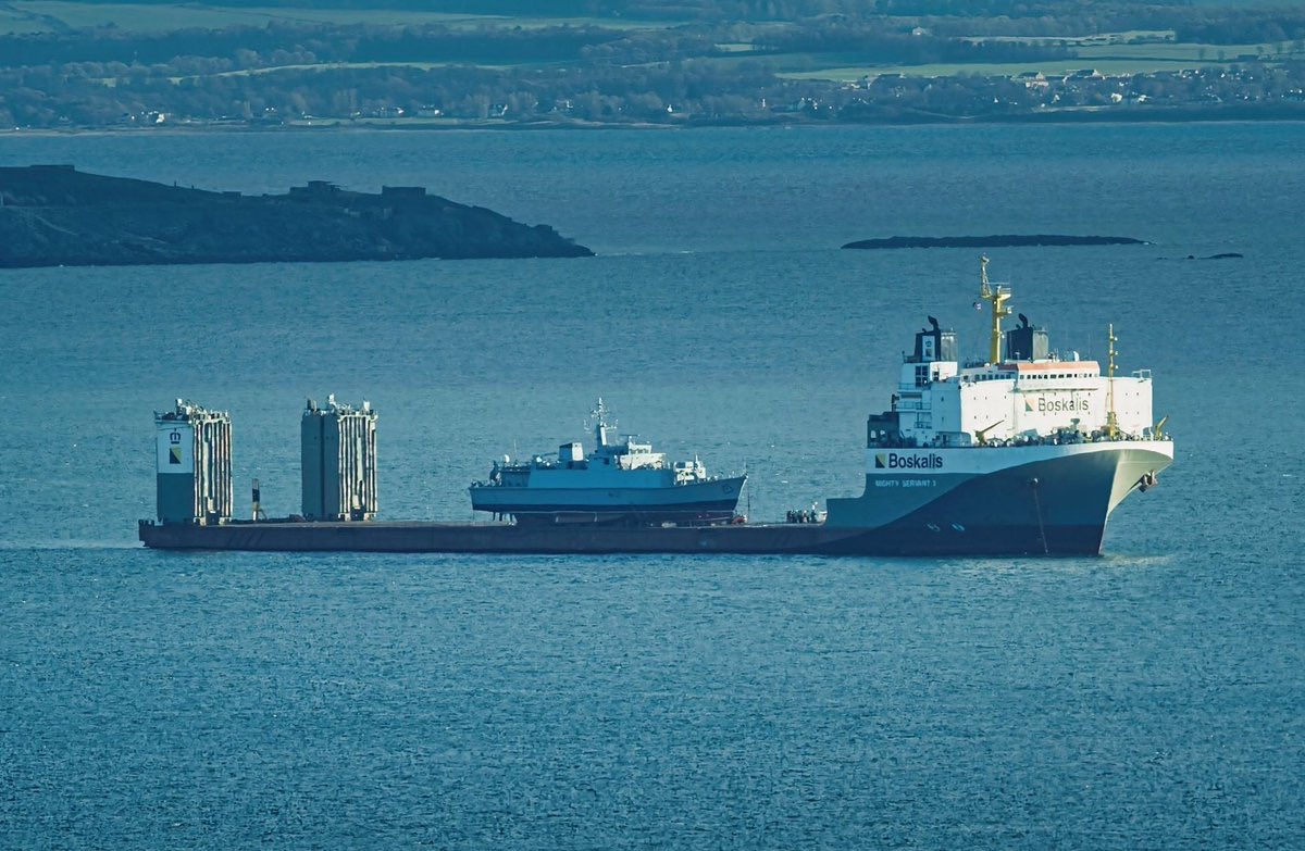 cotcrem's tweet photo. HMS Bangor looks tiny on MV Mighty Servant 3. Returning home to Rosyth from Bahrain December 2025 #navy #shipping #mvmightyservant3 #piggyback #hmsbangor https://t.co/IGFZNFr8K0