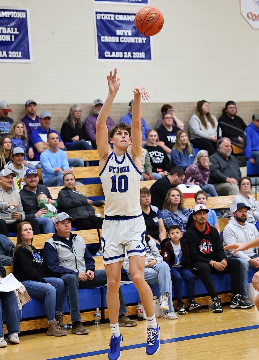 sportsinkansas's tweet photo. St. John sophomore Emmet Delp continues to turn heads. The 6’7 forward had a monster night against Larned, finishing with 32 points, 8 rebounds, and 3 blocks in the Tigers’ win. Delp was ultra-efficient, going 9-for-13 from the field, a perfect 6-for-6 from three, and 8-for-8 at the free throw line. The win moved St. John to 4-1 on the season as they head into a big matchup at Kiowa County on Friday. Delp isn’t the only weapon for the Tigers either, as three other players are averaging double figures: Braxton Alpers (11.2 ppg), Jace Reyes (10.9 ppg), and Wyatt Mawhirter (10.3 ppg). Mawhirter also stuffed the stat sheet against Larned with 14 points and 10 assists in the win. #sportsinkansas
Photo: Dick Smith