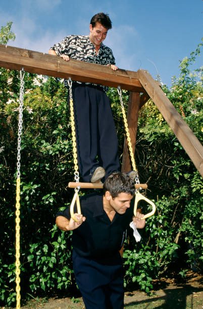 aozorawaltz's tweet image. noah wyle being the youngest person ever in this swingset photoshoot with george clooney oh my god