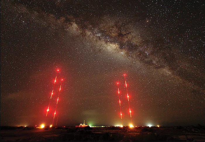 cqcqcqdx's tweet photo. The most powerful AM broadcast transmitter is 450kW operated by TransWorld Radio from the island of Bonaire. This religious station operates on 800kHz as “Shine 800” and targets audiences across the Caribbean and South America. But its powerful signal is widely heard in the USA.

In addition it uses three different directional antenna patterns to boost the strength of its signal into its target listening areas. 

The 440 kW Nautel NX400 transmitter feeds into a four tower Kintronic antenna system which was completed in January 2019.
(image) Four mast array at TWR Bonaire by night.