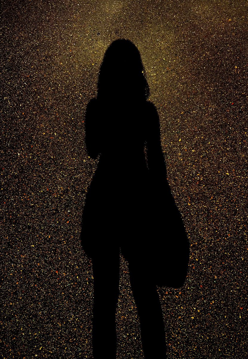 my shadow on side walk dueing heatwave but the low exposure asphalt is giving the hubble deep field