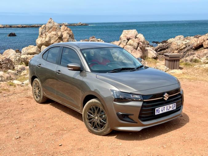 AutoTraderSA's tweet photo. Suzuki’s Dzire #sedan shares its Heartect bones with the #Swift, but adds a big boot,  tech, and low running costs. Is this the baby sedan to get, or should you buy a Kia #Pegas, Honda #Amaze or Hyundai #i10 sedan? https://t.co/jHAtm0o8to https://t.co/zmk12dHDwx