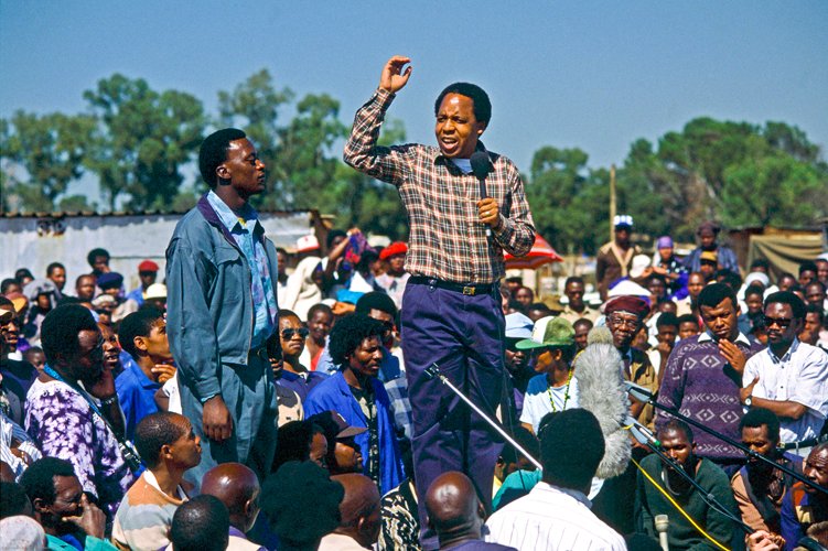 HistorySAZAR's tweet image. Chris Hani speaking at a gathering, 1991. Louise Gubb Photographic Collection/UCT Special Collections